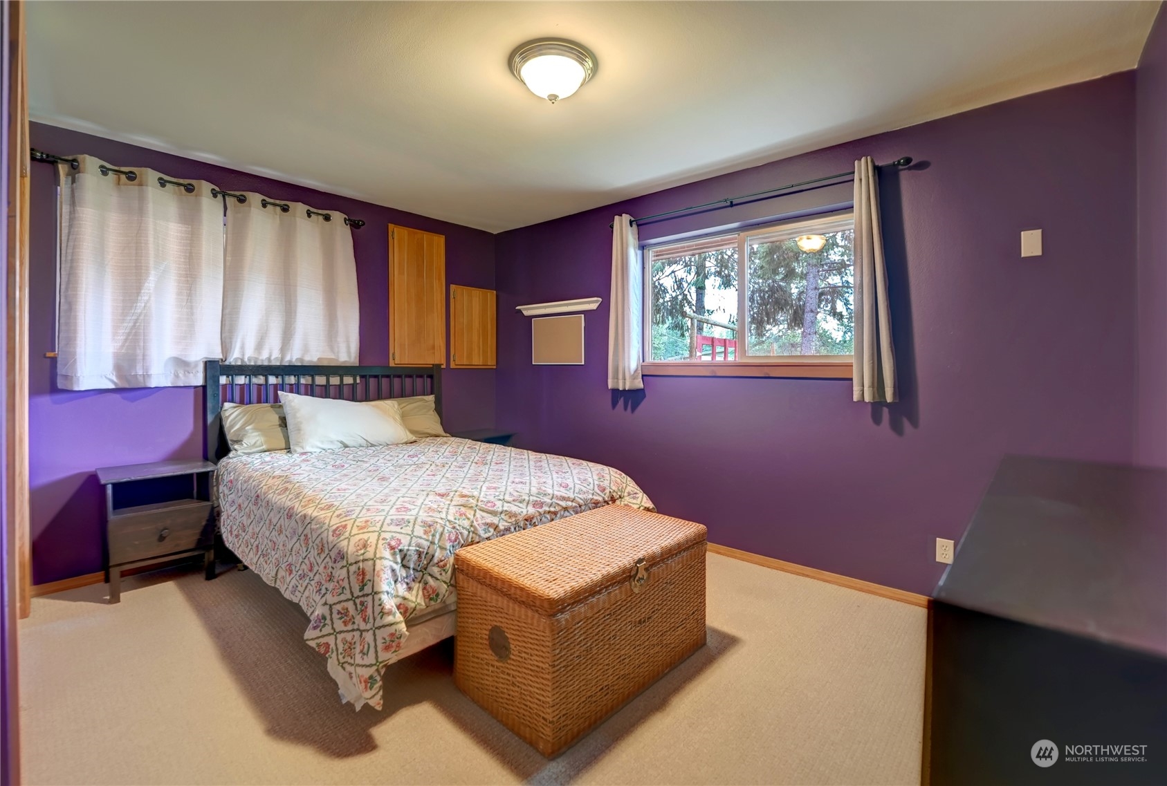 6 Rising Eagle Road Twisp, WA 98856 - Photo 30 of 40 a bedroom with a bed and window