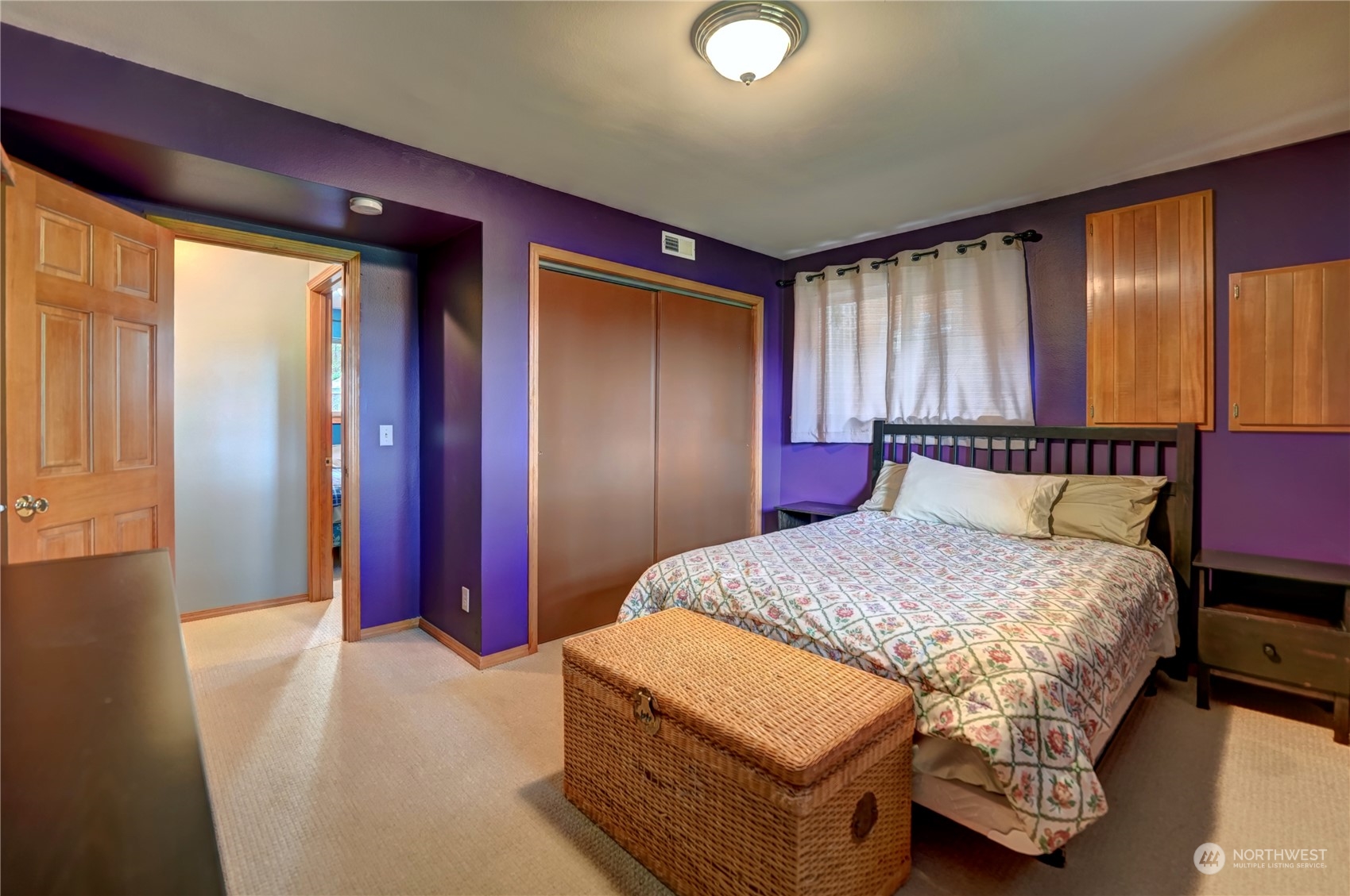 6 Rising Eagle Road Twisp, WA 98856 - Photo 31 of 40 a spacious bedroom with a bed and a dresser