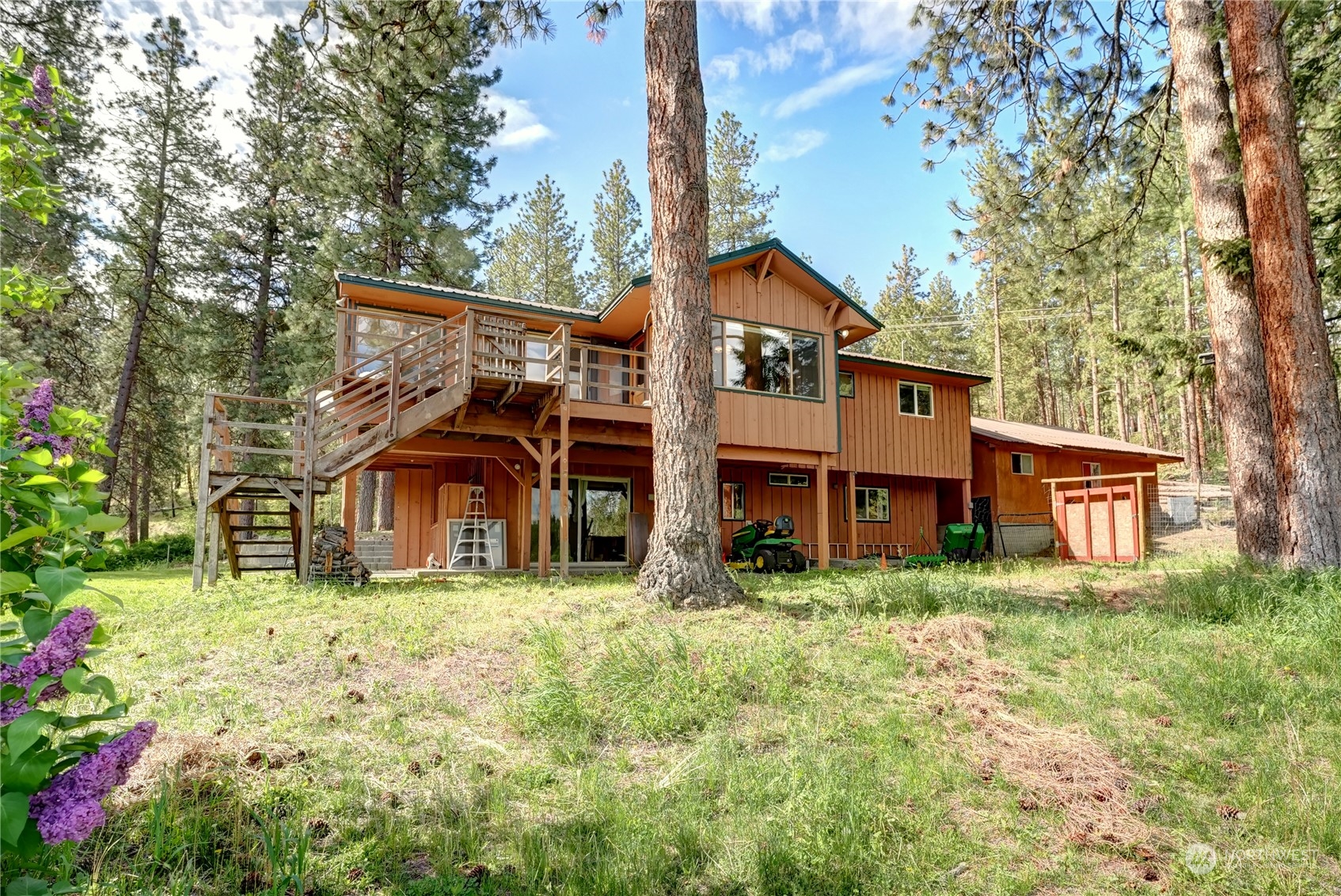 6 Rising Eagle Road Twisp, WA 98856 - Photo 35 of 40 front view of a house with a yard