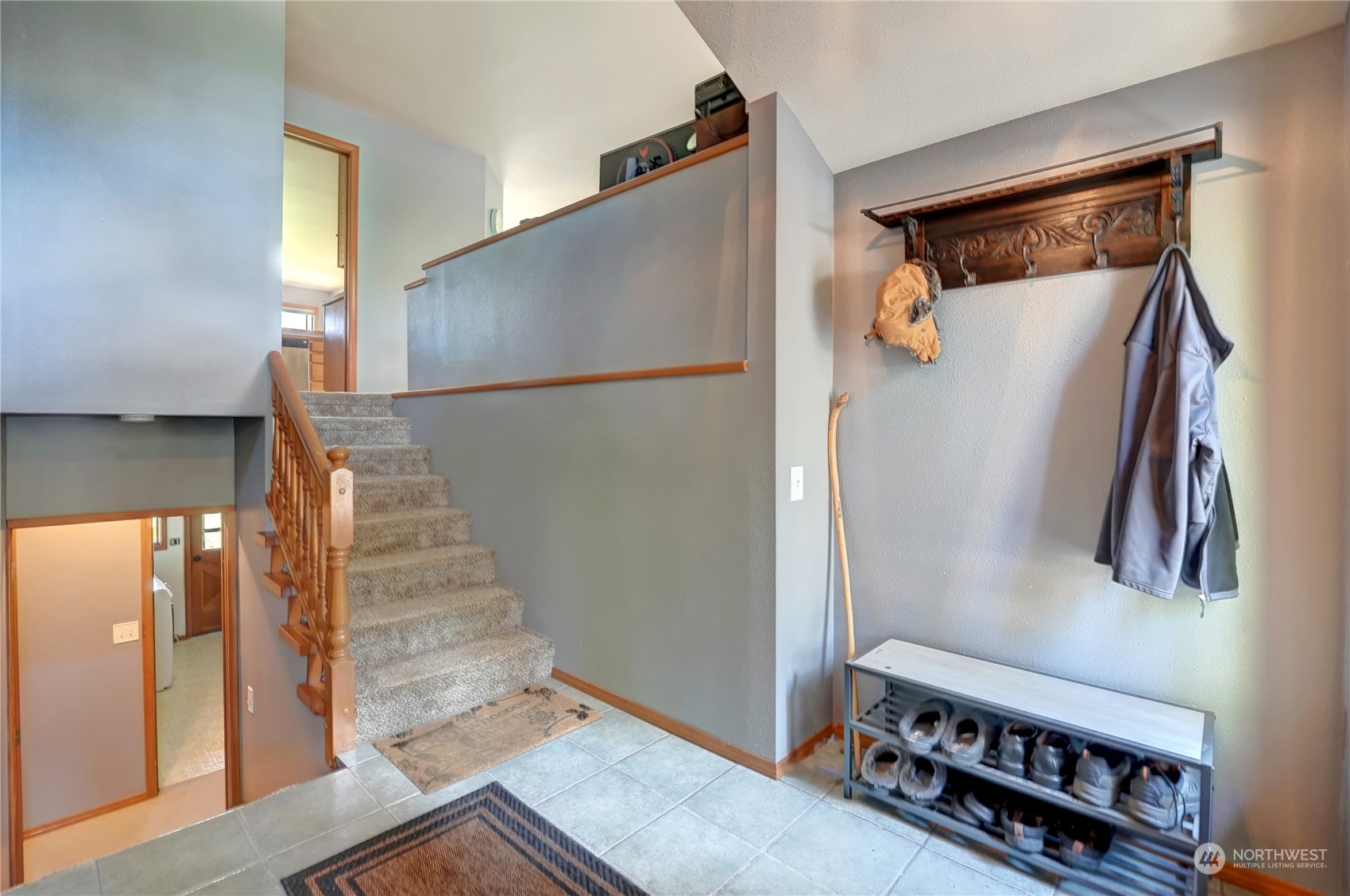 6 Rising Eagle Road Twisp, WA 98856 - Photo 6 of 40 a view of a living room with entryway and wooden floor