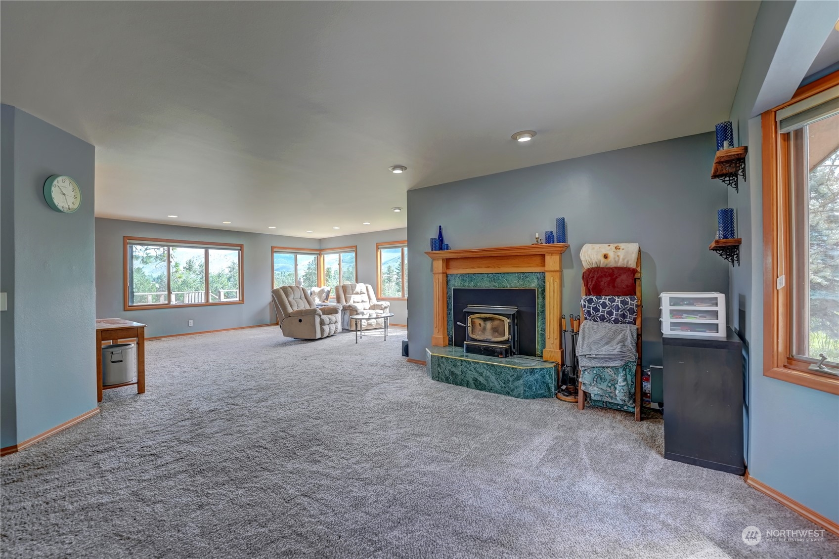 6 Rising Eagle Road Twisp, WA 98856 - Photo 7 of 40 a view of livingroom with furniture and a fireplace