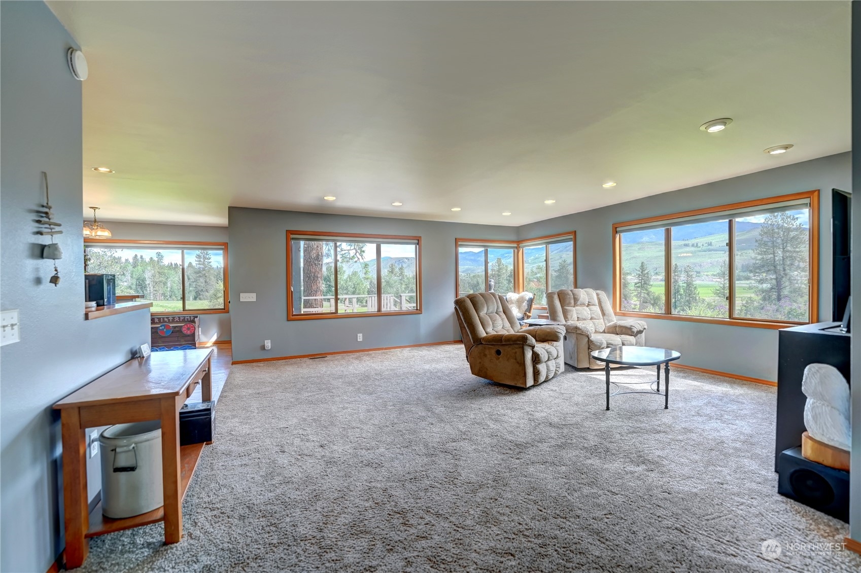 6 Rising Eagle Road Twisp, WA 98856 - Photo 8 of 40 a living room with furniture and a large window