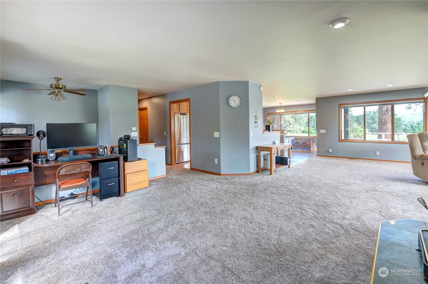 6 Rising Eagle Road Twisp, WA 98856 - Photo 9 of 40 a living room with furniture and a flat screen tv
