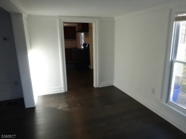 a view of a room that has a window in it