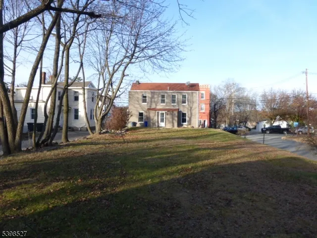 a view of street with houses