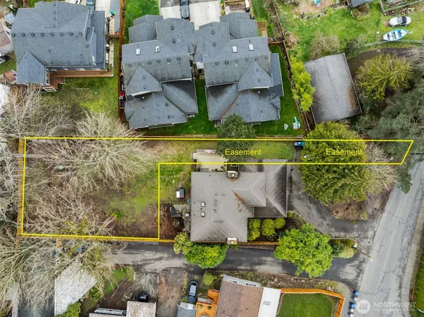an aerial view of a house with a garden