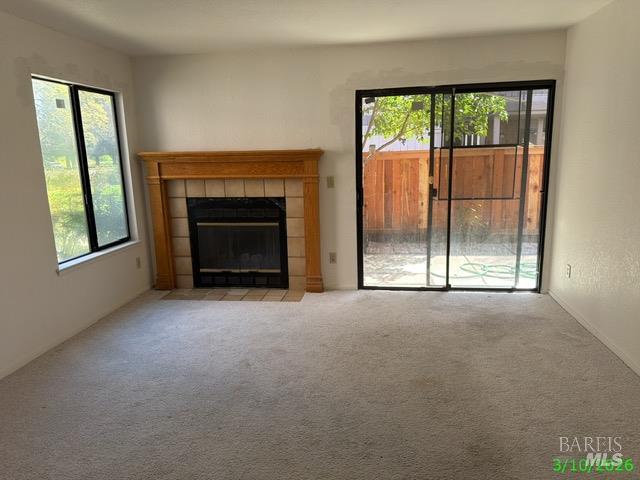 1801 Marshall Road, Unit 403 Vacaville, CA 95687 - Photo 2 of 7 wooden floor fireplace and windows in an empty room