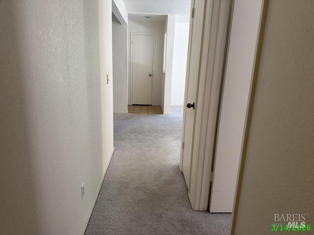 1801 Marshall Road, Unit 403 Vacaville, CA 95687 - Photo 3 of 7 a view of a hallway with a door