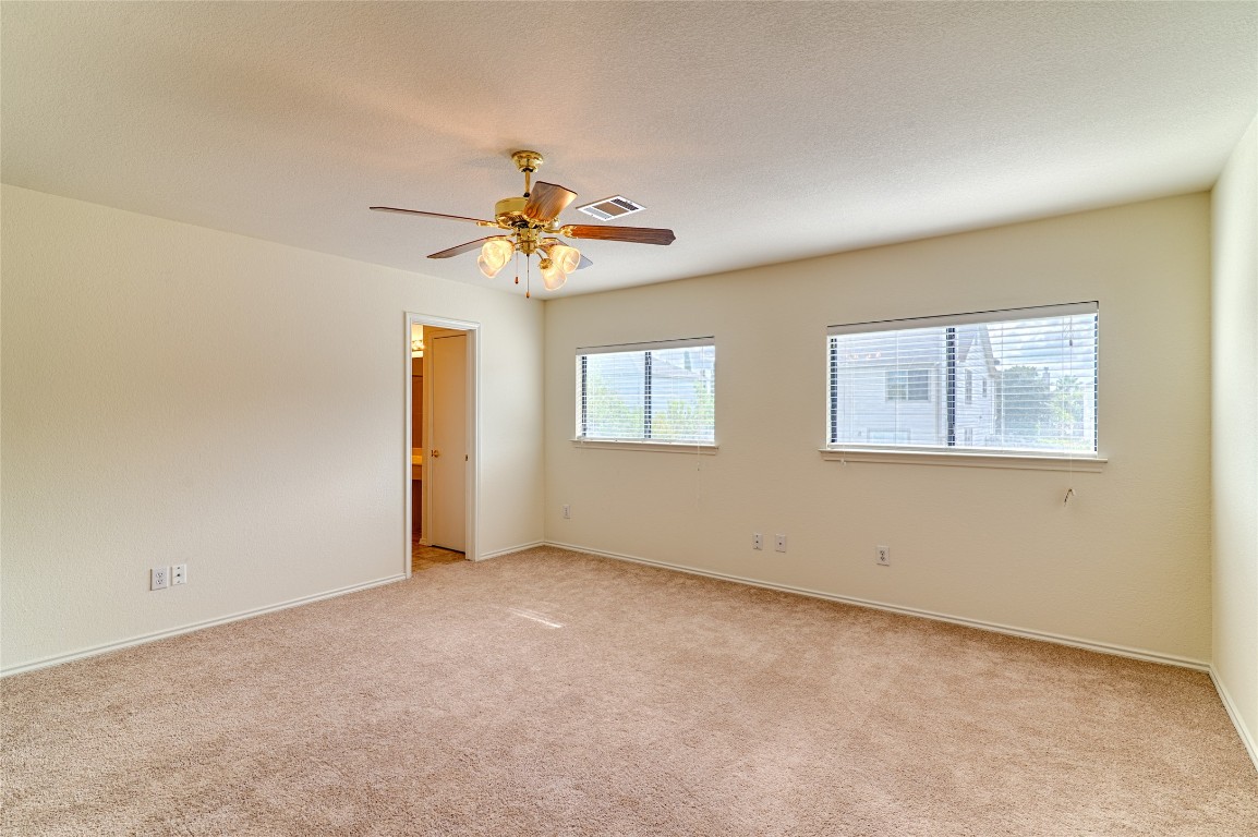6433 Tara Drive Austin, TX 78747 - Photo 5 of 9 a view of an empty room with a window