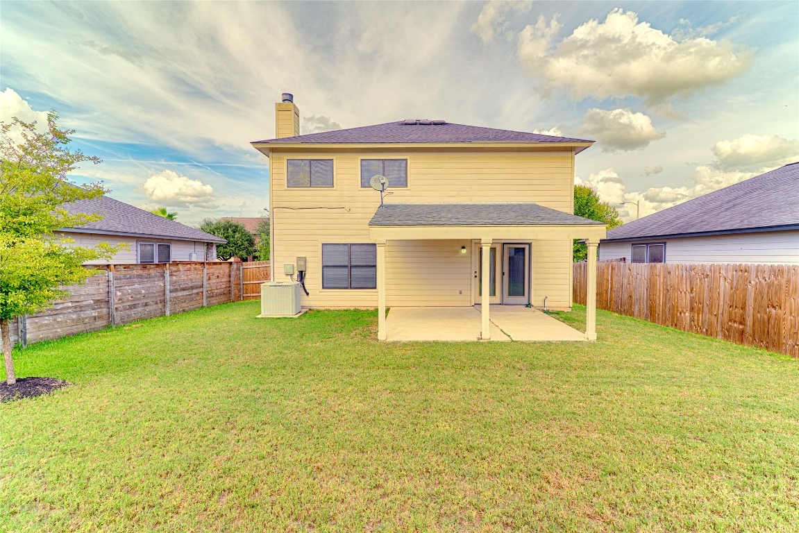 6433 Tara Drive Austin, TX 78747 - Photo 9 of 9 a front view of a house with a yard