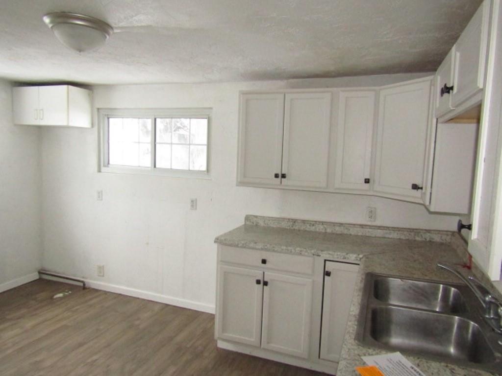 84 2nd Street California, PA 15419 - Photo 13 of 28 a view of cabinets with wooden floor