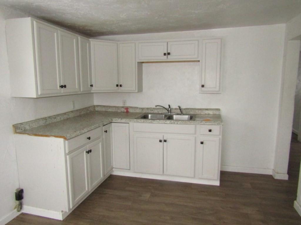 84 2nd Street California, PA 15419 - Photo 14 of 28 a view of cabinets with wooden floor