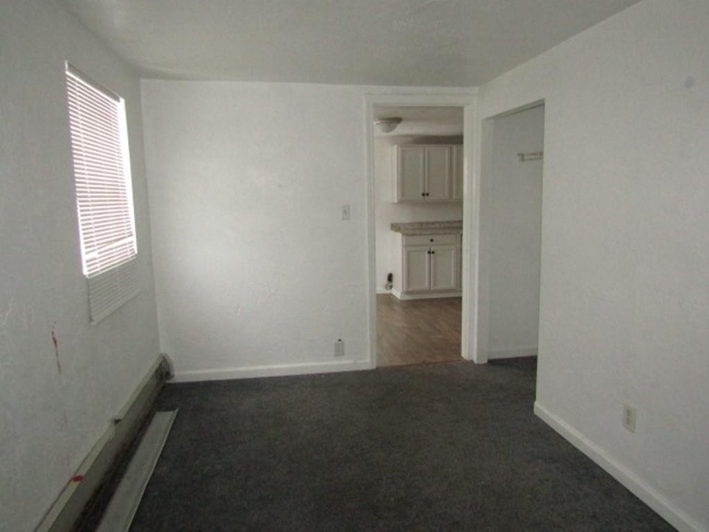 84 2nd Street California, PA 15419 - Photo 16 of 28 an empty room with closet and a window