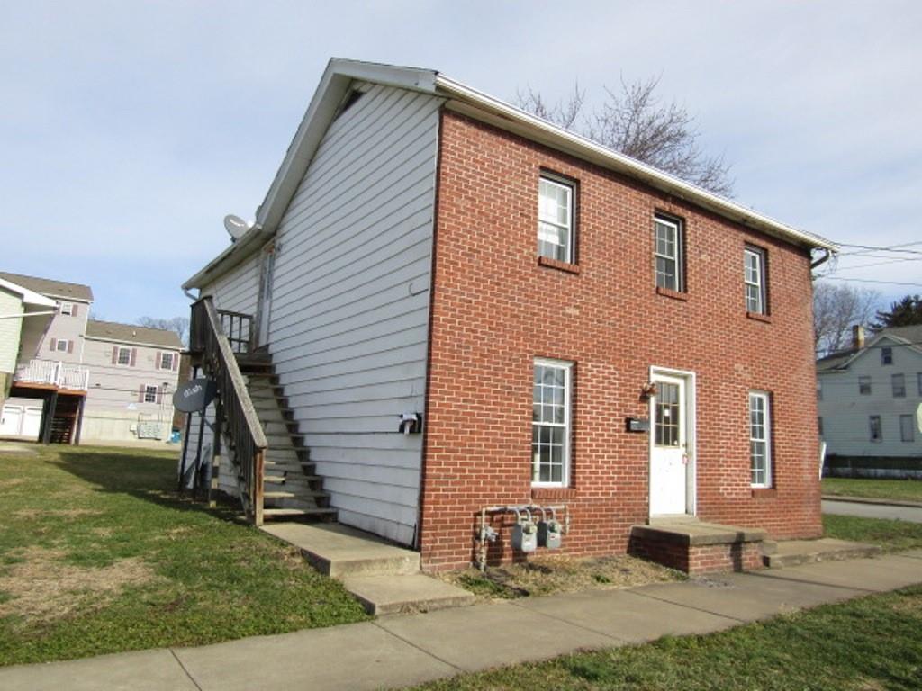 84 2nd Street California, PA 15419 - Photo 2 of 28 a front view of house with a yard