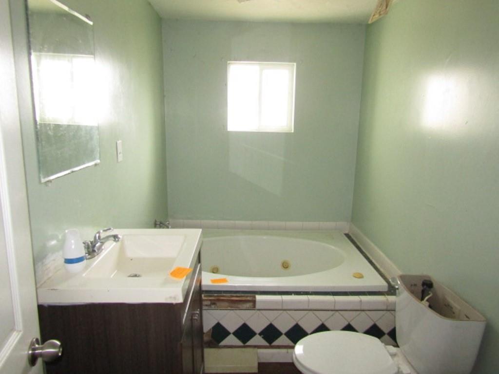 84 2nd Street California, PA 15419 - Photo 24 of 28 a bathroom with a sink and a bathtub