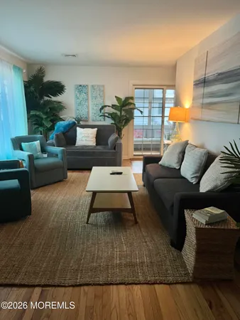 a living room with furniture and a couch