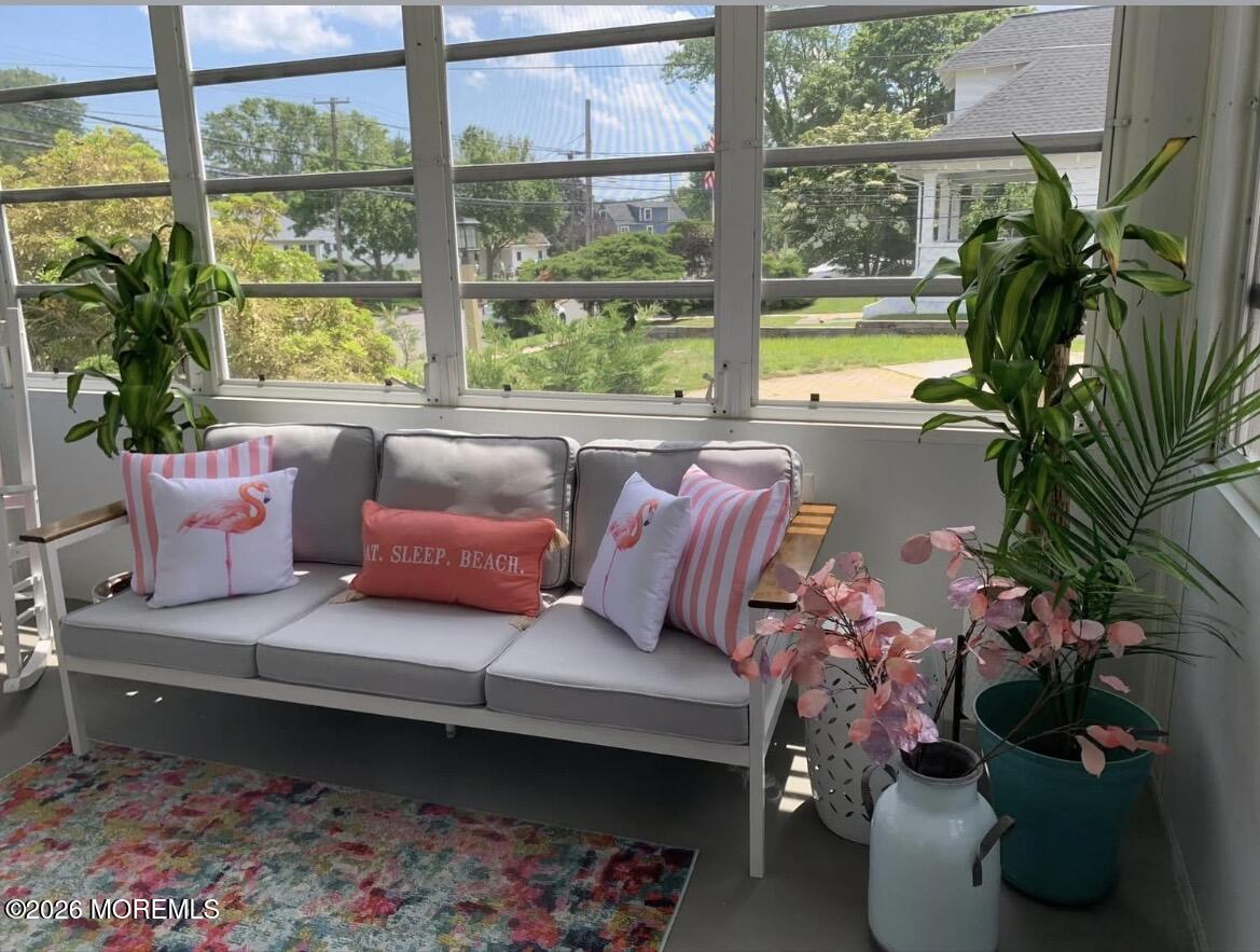 2001 Main Street Lake Como, NJ 07719 - Photo 21 of 26 a living room with furniture and a potted plant