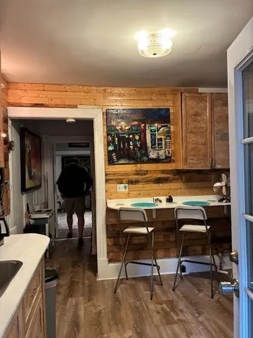 a view of a chairs and table in a room