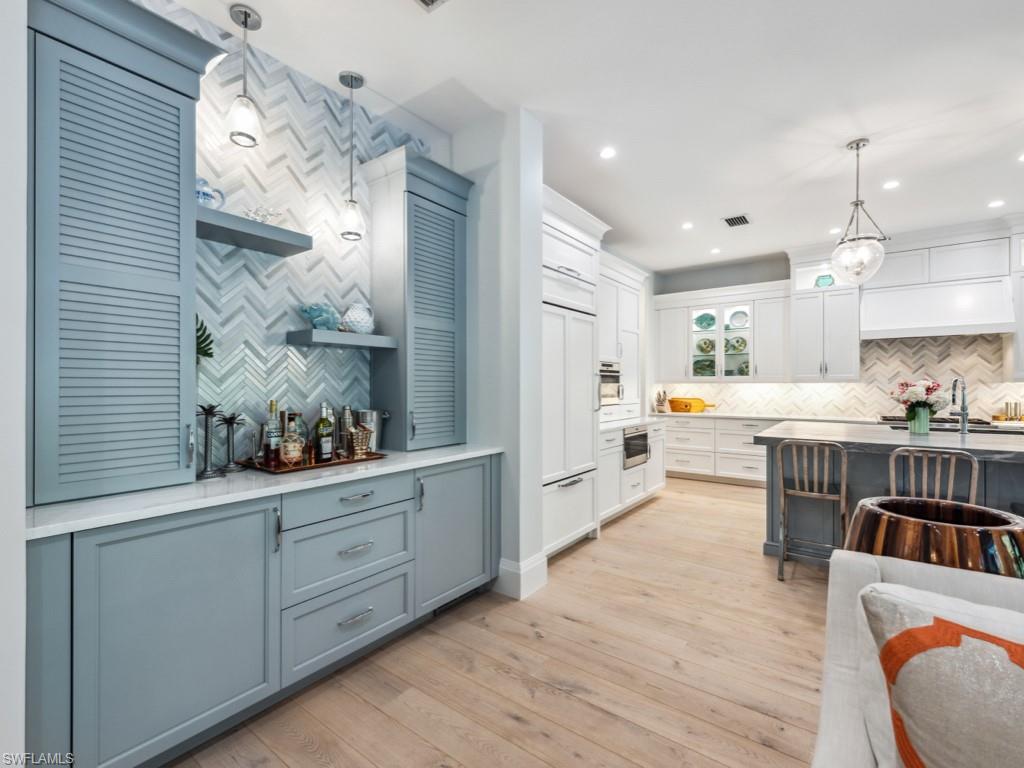533 Turtle Hatch Lane Naples, FL 34103 - Photo 18 of 50 Bar with separate beverage cooler and ice maker