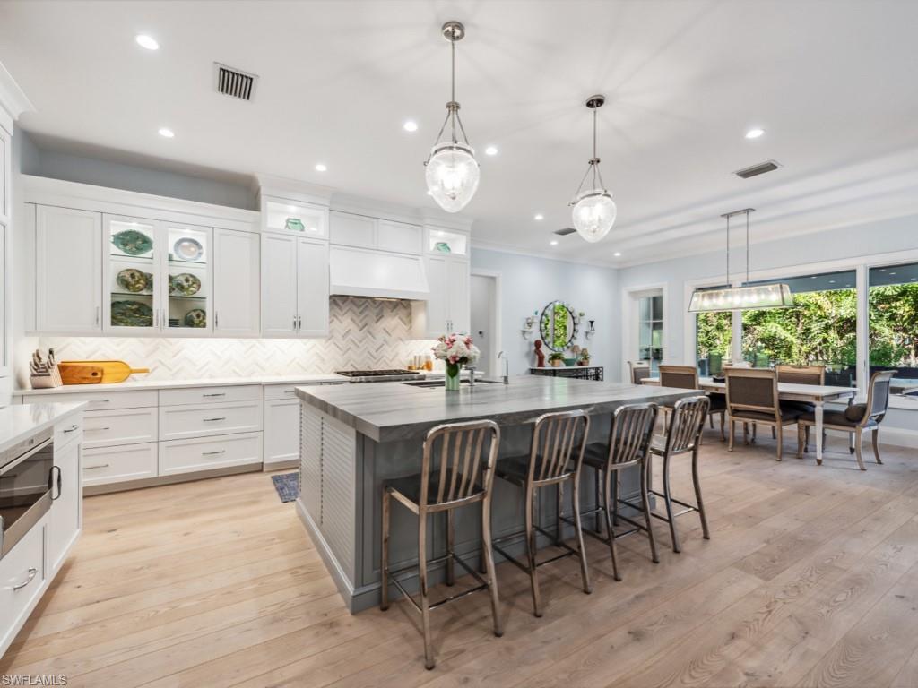 533 Turtle Hatch Lane Naples, FL 34103 - Photo 19 of 50 Large island with gorgeous leathered quartzite top
