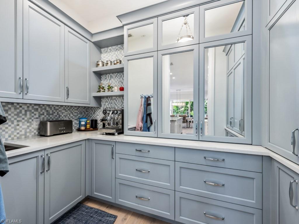 533 Turtle Hatch Lane Naples, FL 34103 - Photo 21 of 50 Butler's pantry with sink and concealed storage