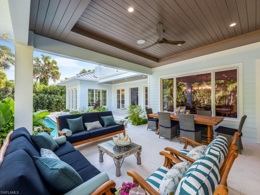 533 Turtle Hatch Lane Naples, FL 34103 - Photo 27 of 50 Just outside the media room, an outdoor living room