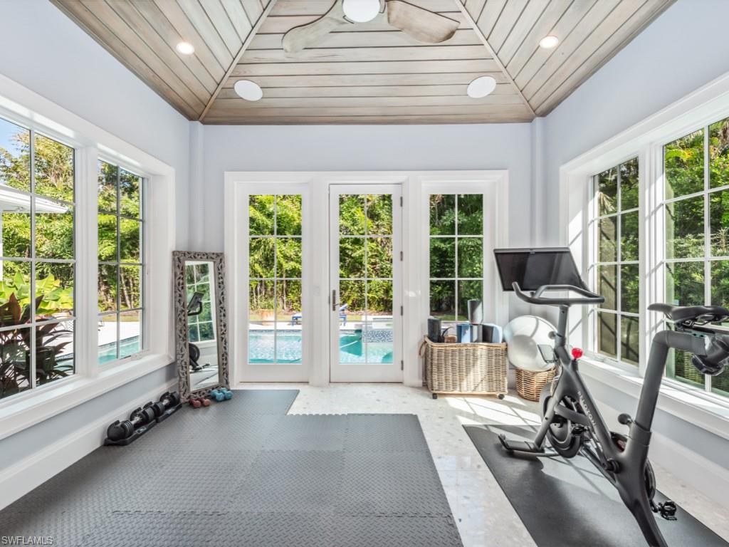 533 Turtle Hatch Lane Naples, FL 34103 - Photo 34 of 50 Fully enclosed and A/C'd exercise room with views