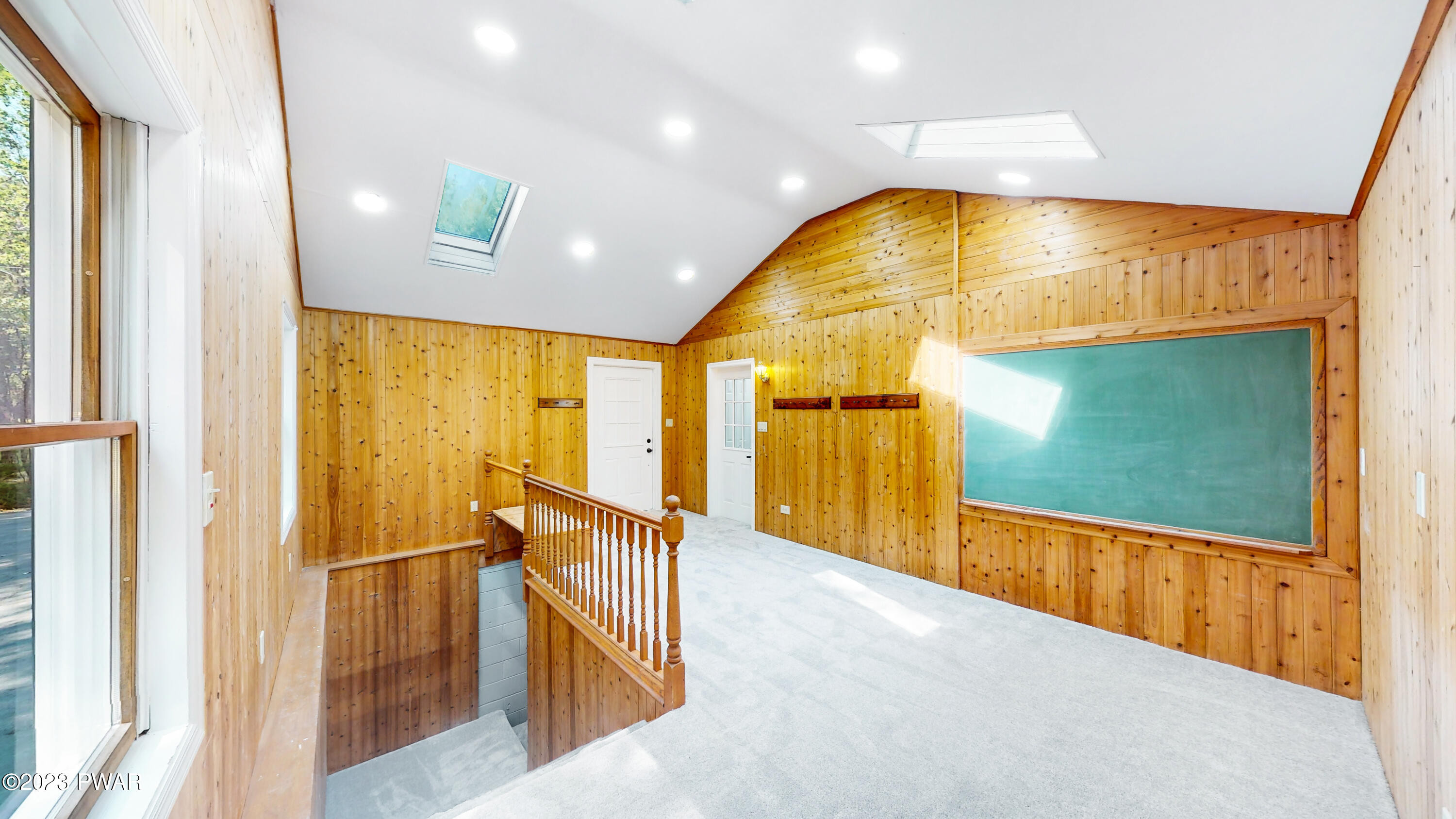 308 Rambling Way Milford, PA 18337 - Photo 12 of 70 Feature Photo: Den w/ Stairs to Basement