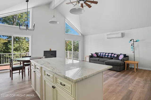 a living room with furniture and a table