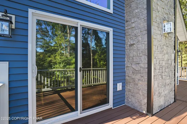 a house with trees in the background