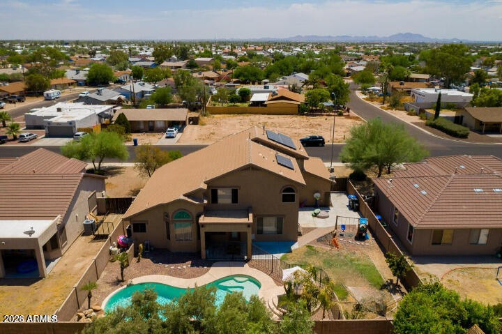 11058 East Cholla Road Mesa, AZ 85207 - Photo 22 of 22 an aerial view of a house with a garden and lake view