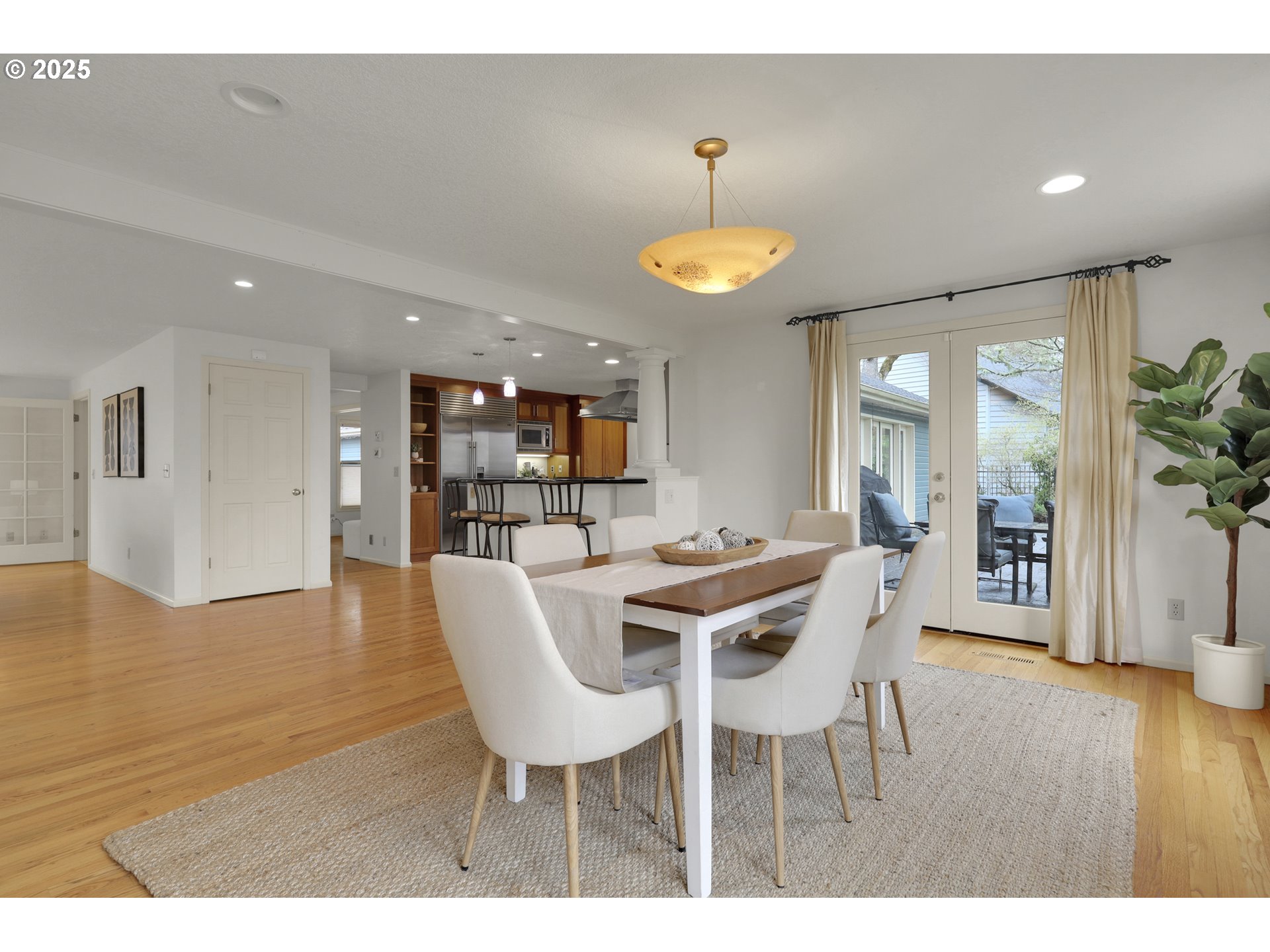 5147 Solar Heights Drive Eugene, OR 97405 - Photo 12 of 29 a view of a dining room with furniture and wooden floor