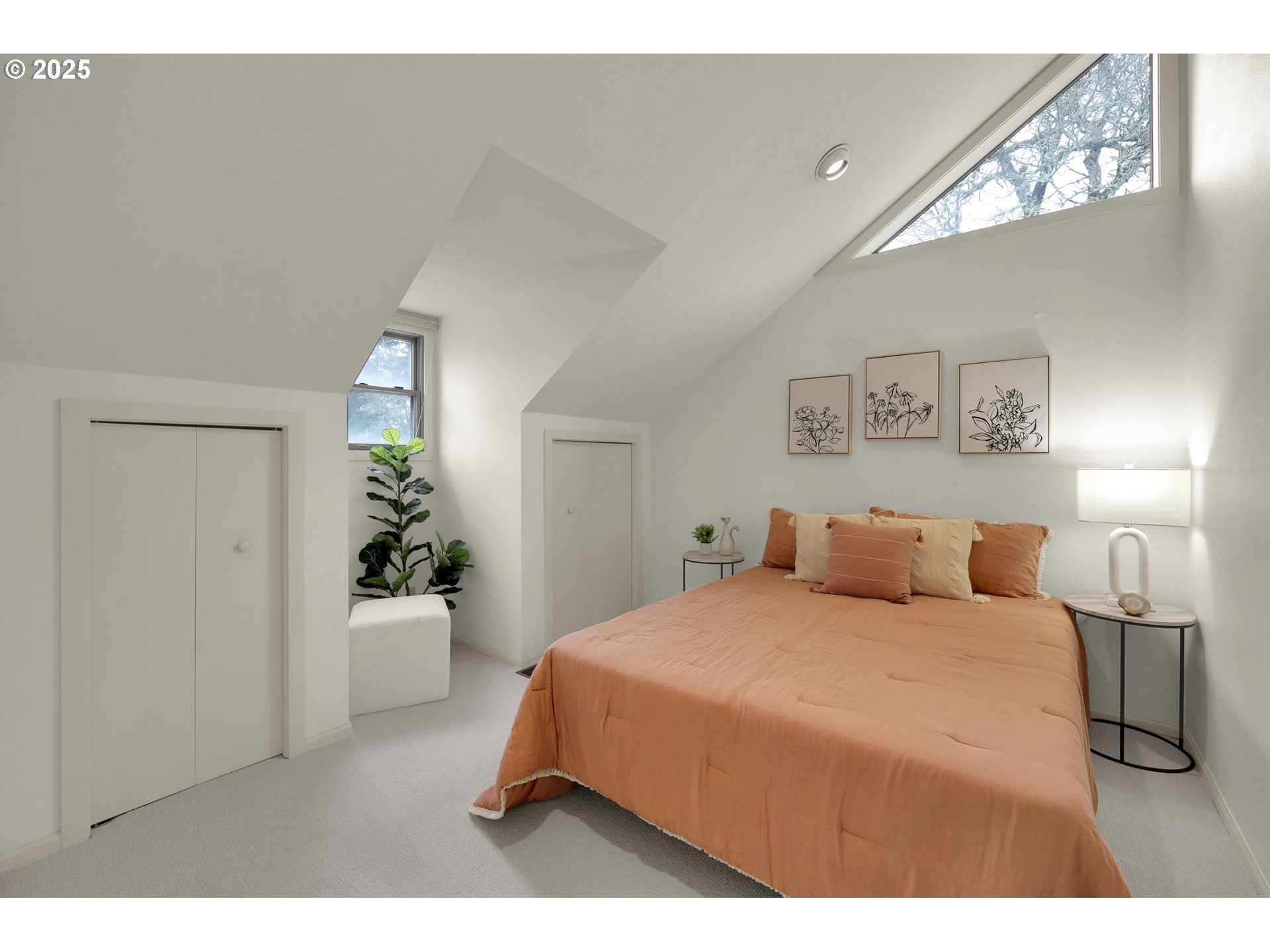 5147 Solar Heights Drive Eugene, OR 97405 - Photo 22 of 29 a bedroom with a bed and a potted plant