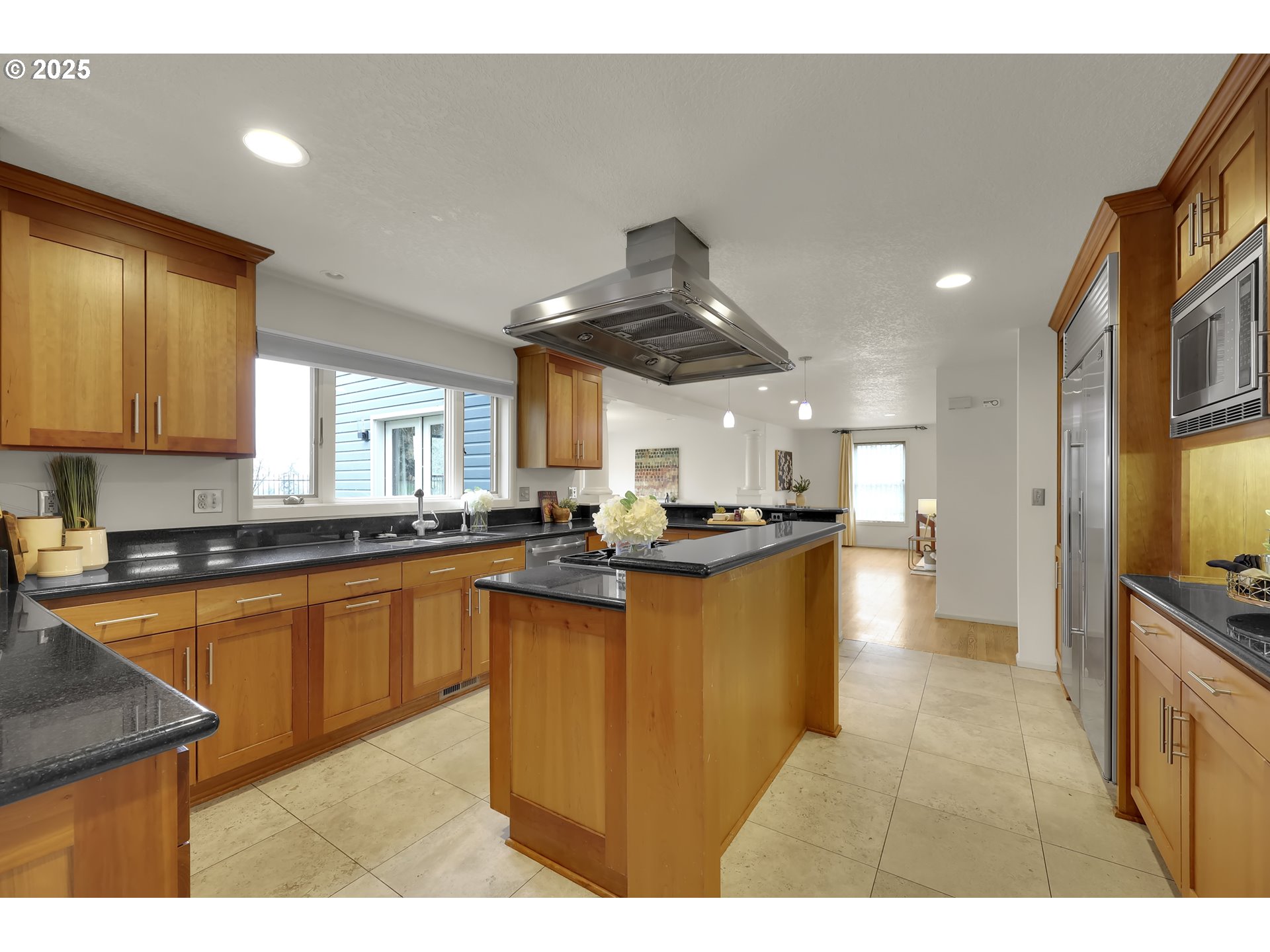 5147 Solar Heights Drive Eugene, OR 97405 - Photo 7 of 29 a kitchen with stainless steel appliances granite countertop a sink a stove and a refrigerator
