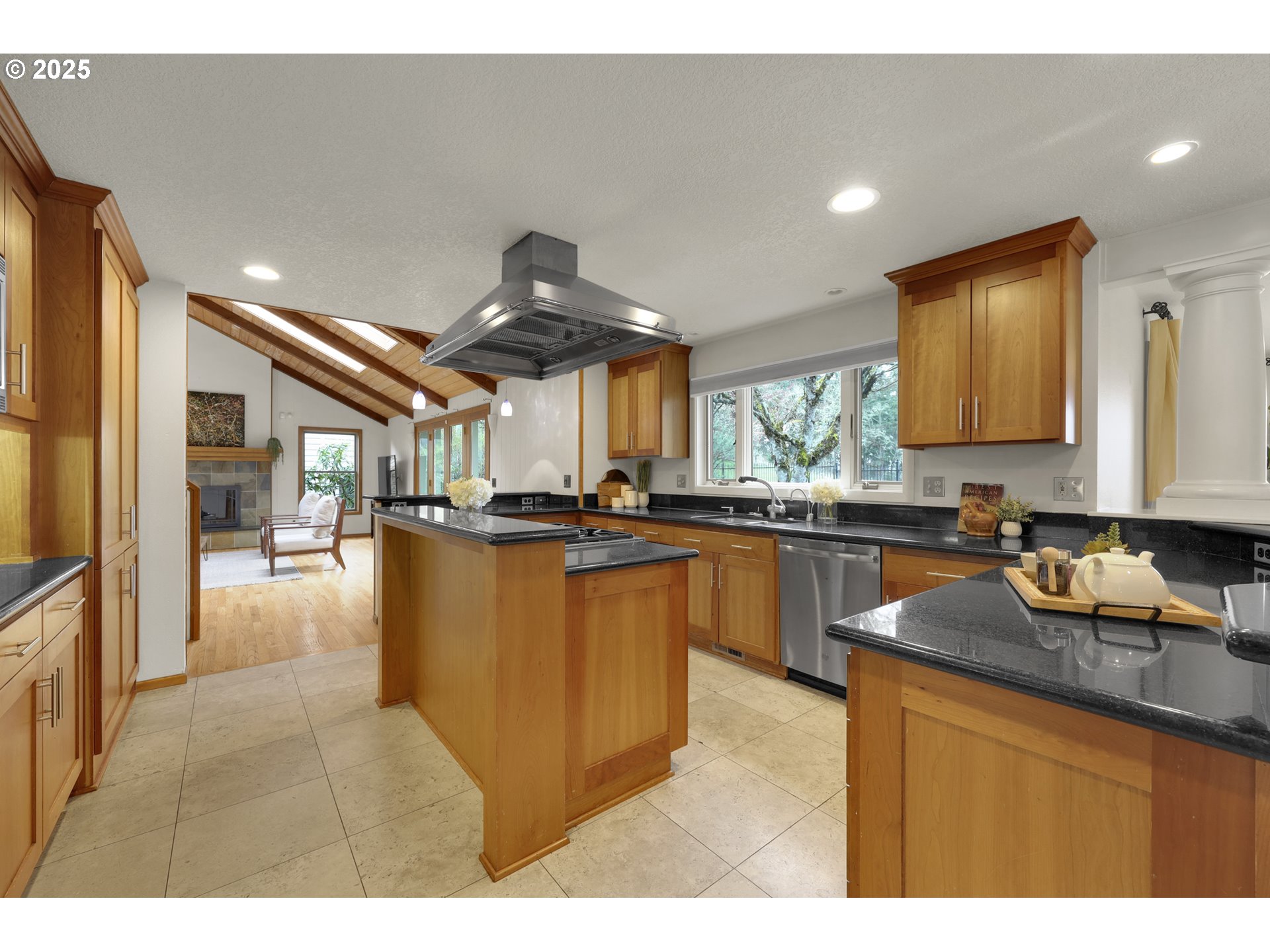 5147 Solar Heights Drive Eugene, OR 97405 - Photo 8 of 29 a kitchen with granite countertop a sink cabinets and stainless steel appliances