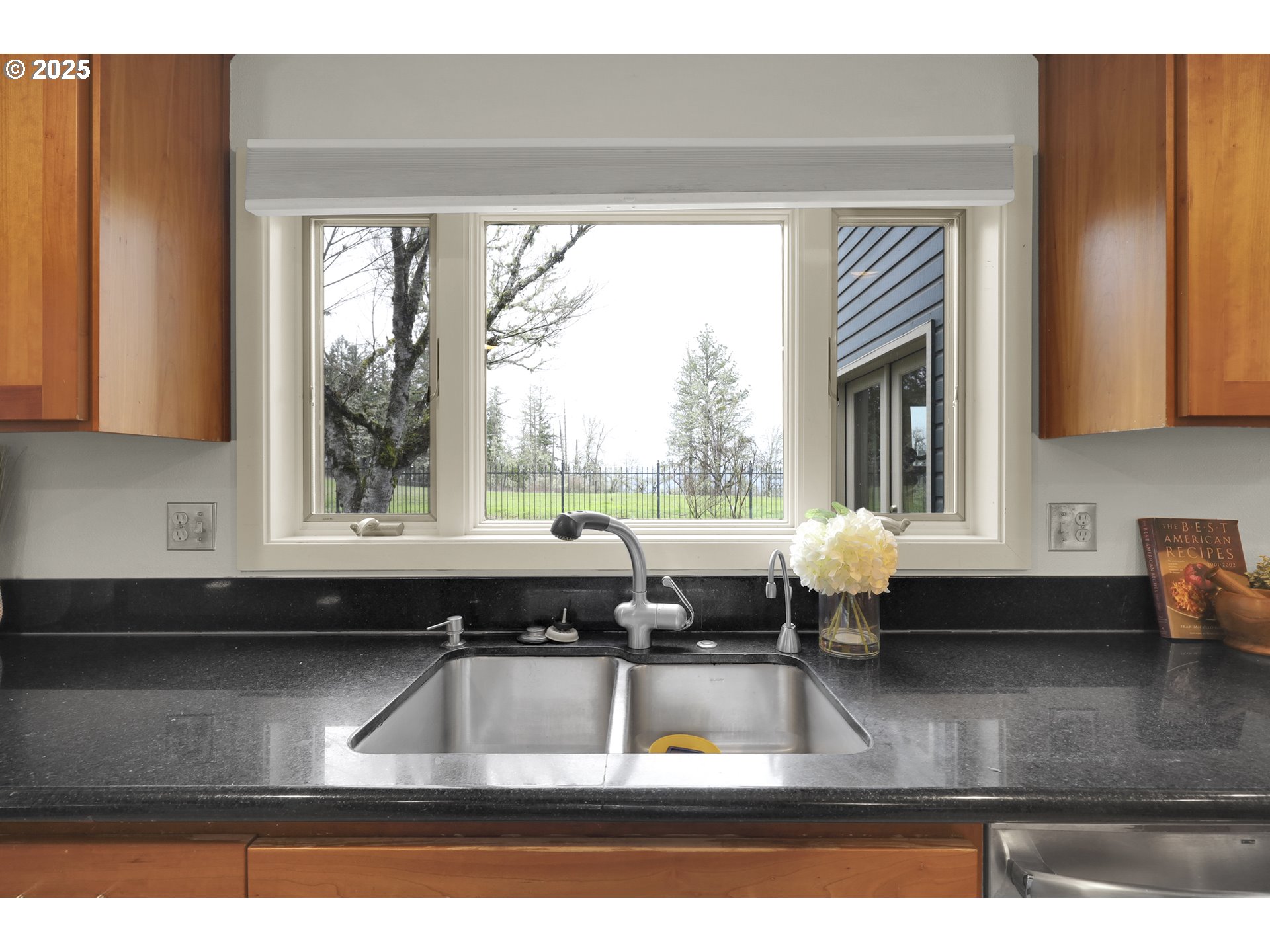 5147 Solar Heights Drive Eugene, OR 97405 - Photo 9 of 29 a kitchen with a window a sink and a cabinets