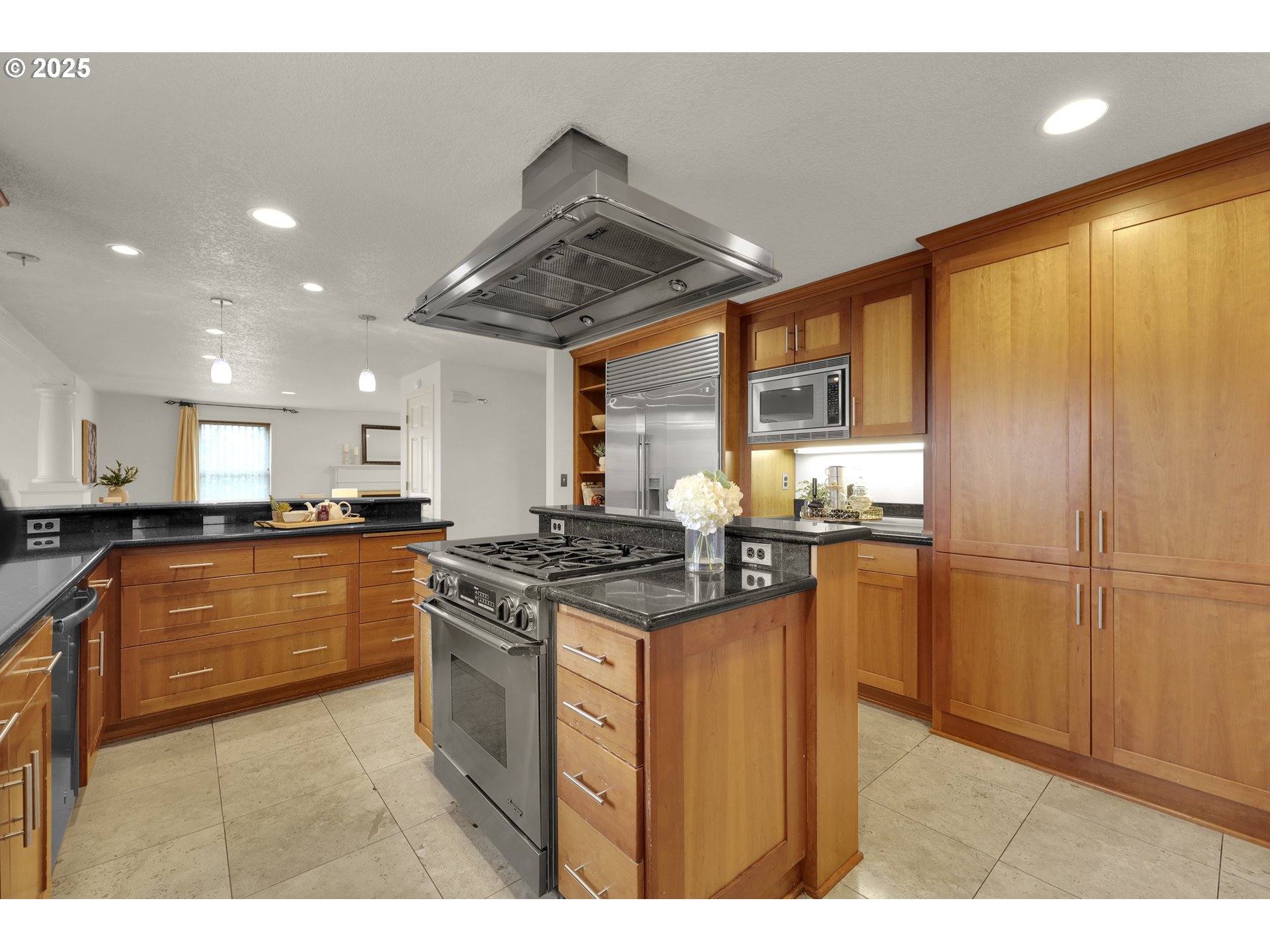 5147 Solar Heights Drive Eugene, OR 97405 - Photo 10 of 29 a kitchen with stainless steel appliances granite countertop a stove a sink dishwasher and a refrigerator