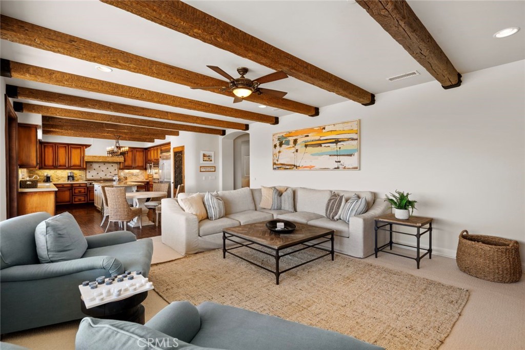 5 Via Monarca Street Dana Point, CA 92629 - Photo 13 of 57 a living room with furniture and a large window