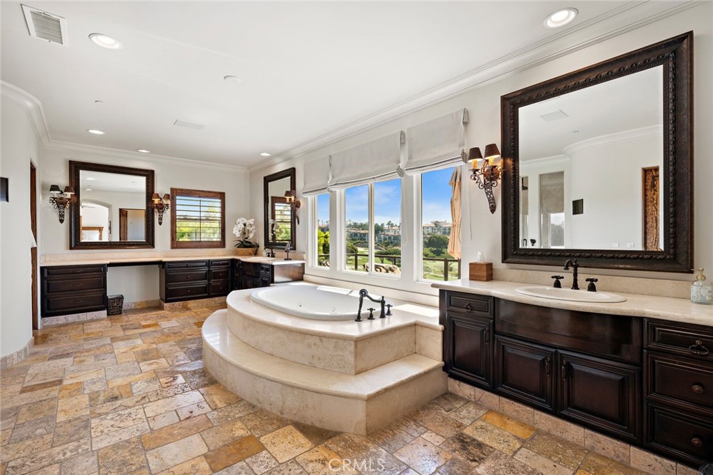5 Via Monarca Street Dana Point, CA 92629 - Photo 23 of 57 a spacious bathroom with a double vanity sink tub and mirror