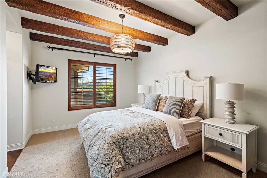 5 Via Monarca Street Dana Point, CA 92629 - Photo 29 of 57 a bedroom with a bed and a window