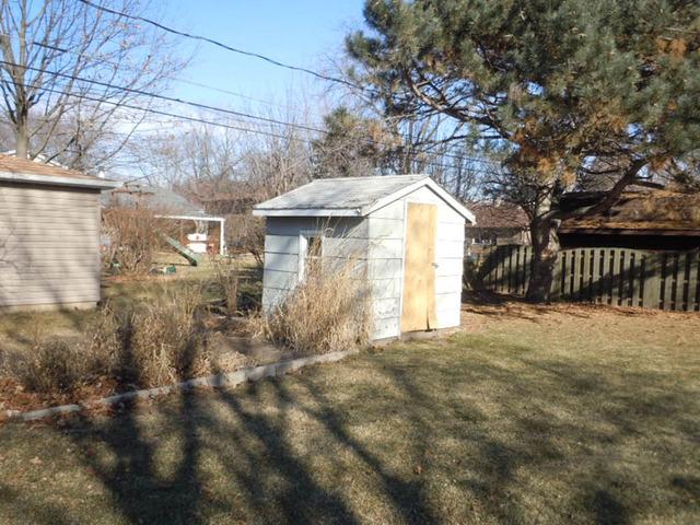 1752 East Corktree Lane Mount Prospect, IL 60056 - Photo 19 of 20 a view of a house with a yard