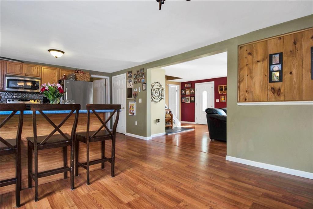 66 Bolsters Mills Road Harrison, ME 04040 - Photo 6 of 33 Kitchen opens to living room.