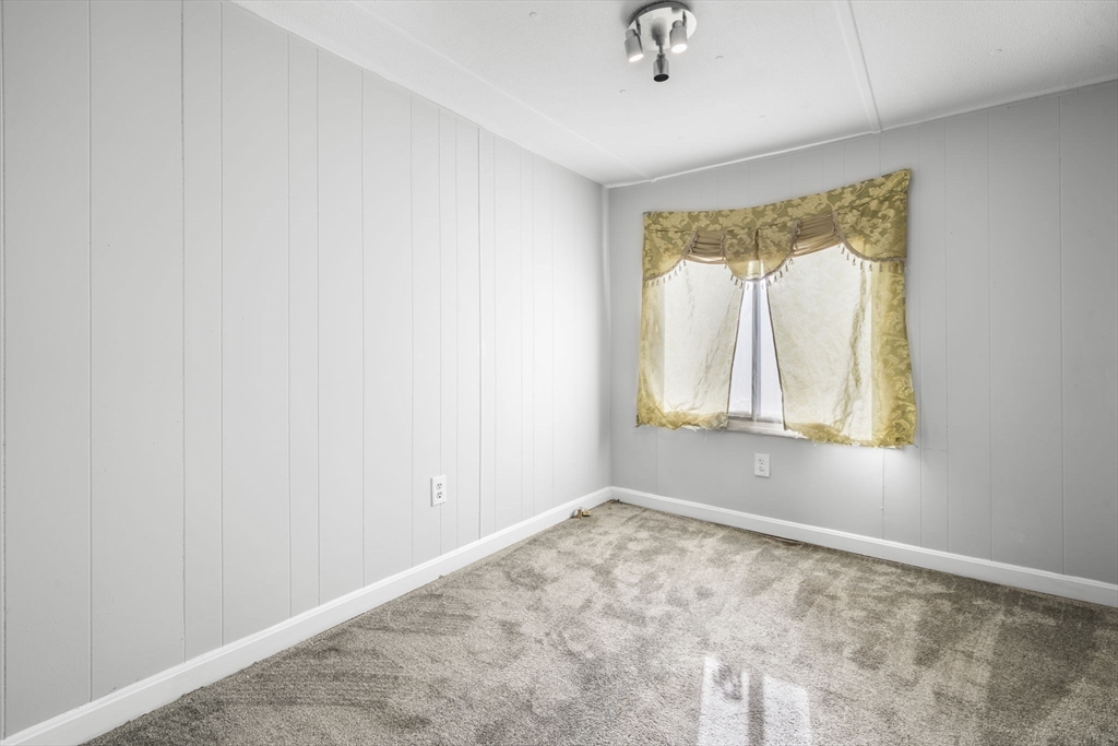 75 South Policy Street, Unit 48 Salem, NH 03079 - Photo 19 of 36 a view of room with window