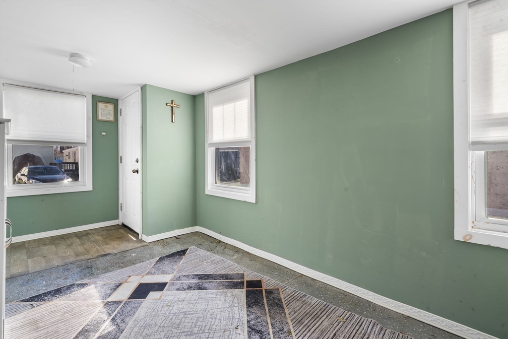 75 South Policy Street, Unit 48 Salem, NH 03079 - Photo 5 of 36 a view of a room that has a window in it