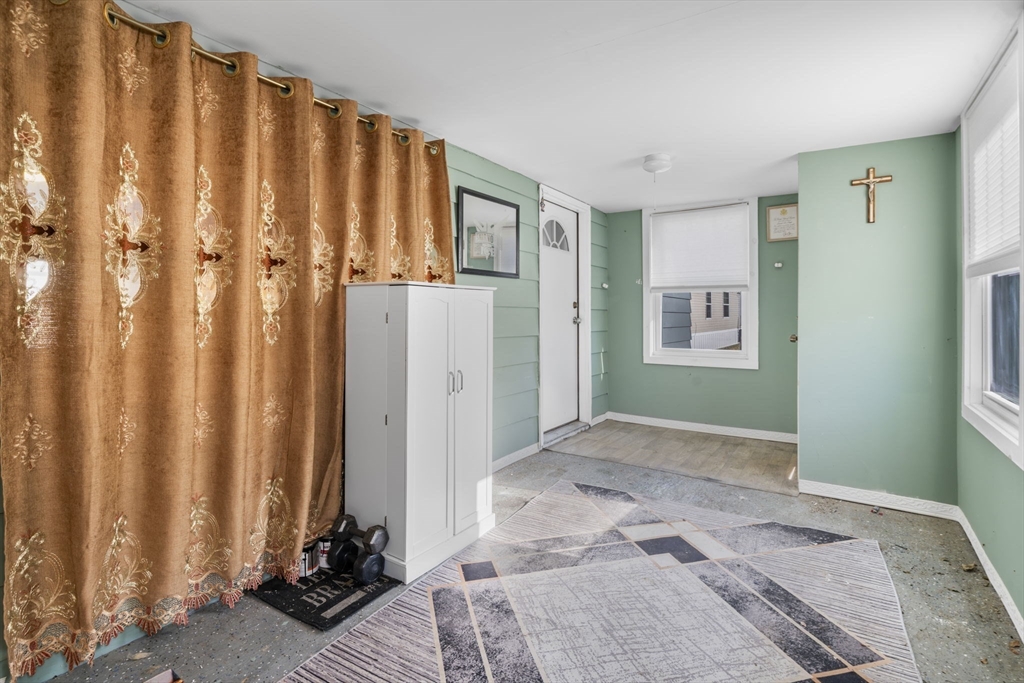 75 South Policy Street, Unit 48 Salem, NH 03079 - Photo 8 of 36 a view of a bedroom with window