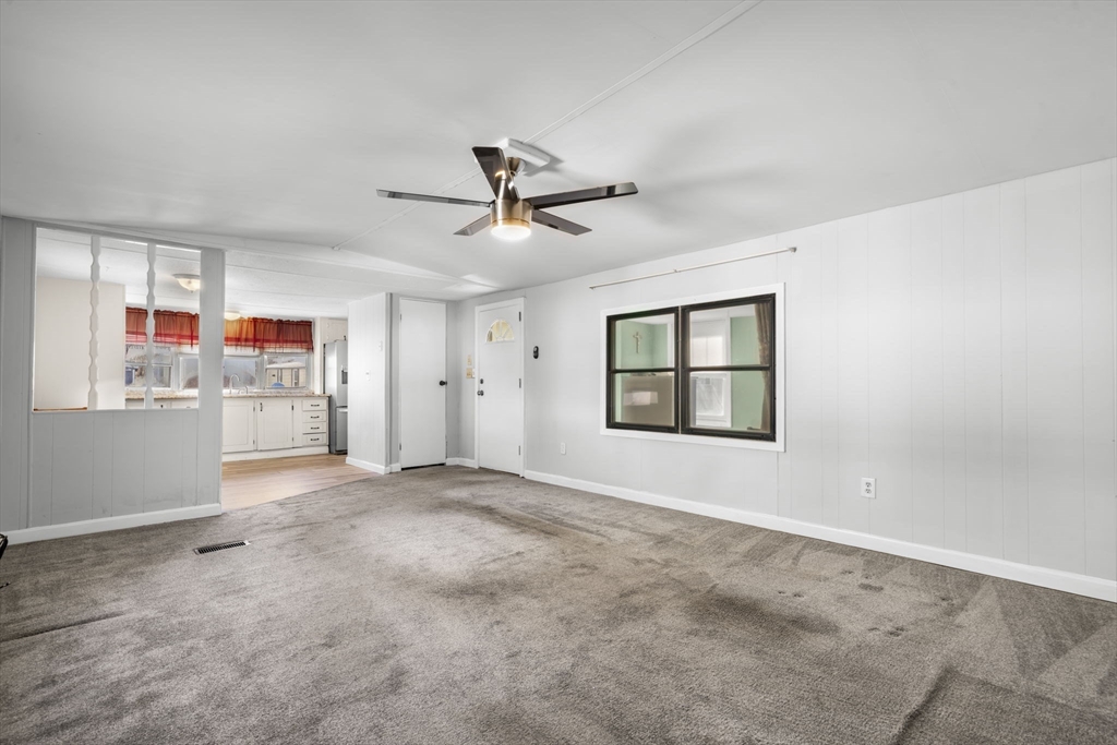 75 South Policy Street, Unit 48 Salem, NH 03079 - Photo 9 of 36 a view of an empty room