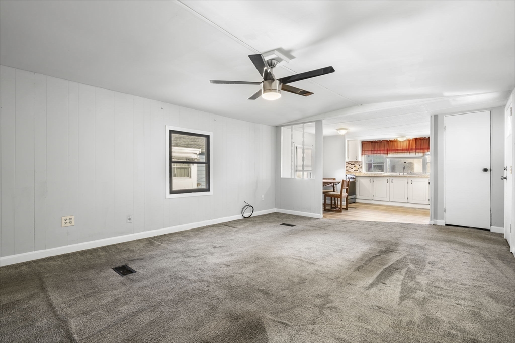 75 South Policy Street, Unit 48 Salem, NH 03079 - Photo 10 of 36 a view of an empty room with a window