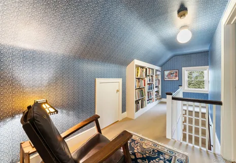 a view of a living room and workspace