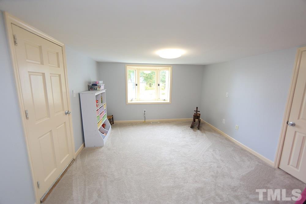 1365 Old Halifax Road Zebulon, NC 27597 - Photo 6 of 23 Downstairs bonus room can be used as an office,or playroom