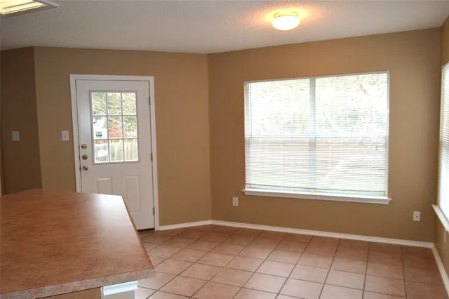 a view of an empty room with window